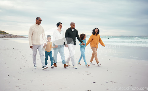 Image of Grandparents, parents and children walking on beach enjoying holiday, travel vacation and weekend together. Big family, nature and happy people holding hands for bonding, quality time and love by sea