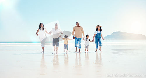 Image of Beach, walking and mockup with a black family holding hands outdoor in nature by the ocean at sunset together. Nature, love or kids with grandparents, parents and children taking a walk on the coast