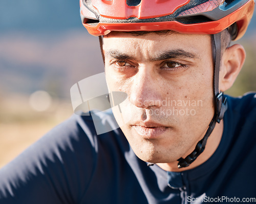 Image of Serious, cycling and face of man in nature for training, fitness and cardio. Focus, vision and professional biker in the countryside for a marathon, race or triathlon for sports, exercise and riding