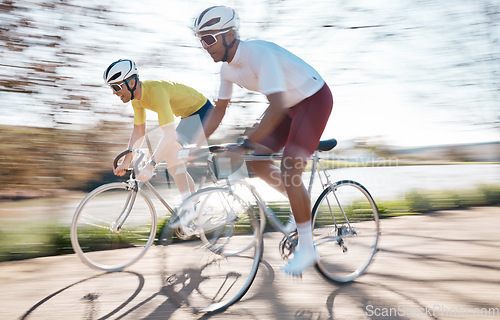 Image of Cycling, speed and men on bicycle with motion blur for adrenaline, extreme sports and action on road. Fitness, mountain biking and friends on bikes for exercise, workout and training for competition