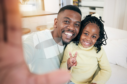Image of Happy, selfie and portrait of a father with his child relaxing, resting and bonding on the sofa together. Happiness, smile and African dad taking a picture with girl kid while sitting in living room.