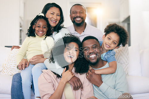 Image of Black family, smile and portrait on sofa with kids, parents and grandparents with happiness, love and care. Senior man, women and children with generations, hug and bonding in living room on holiday