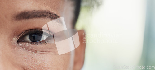 Image of Eye focus, vision zoom and mockup of a black woman outdoor with blurred background. Eyes closeup, portrait and health care for optometry and eyesight check with a young African female with mock up
