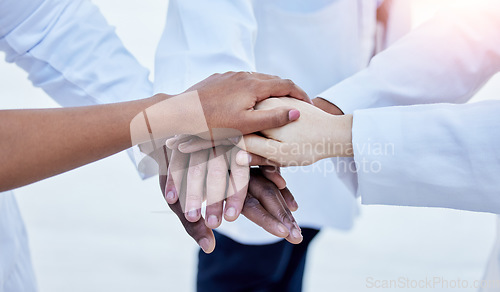 Image of Support, teamwork and medical with hands of doctors for community, diversity and solidarity. Healthcare, synergy and stack with group of people for mission, medicine and motivation in hospital