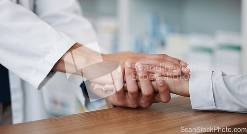 Image of Empathy, support and pharmacy with hand holding with people for consulting, rehabilitation and results. Kindness, medical and healthcare with expert and patient for healing, help and sympathy