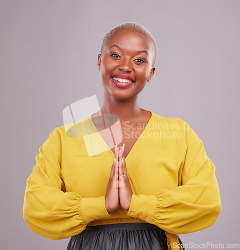 Image of Woman, praying and hands together in religion, faith and hope or thank you of career opportunity on studio background. Christian or African person in gratitude portrait, peace emoji and ngo business