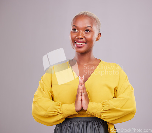 Image of Happy woman, prayer and thinking of faith, religion and hope or thank you for career opportunity on studio background. Christian or African person namaste, gratitude emoji and vision for ngo business