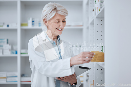 Image of Pharmacy, senior woman and tablet with pills, inventory and checking stock with connection, smile and research. Old person, pharmacist and employee with technology, medical medication and telehealth