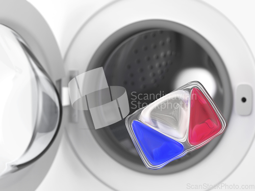 Image of Laundry detergent pod and washing machine