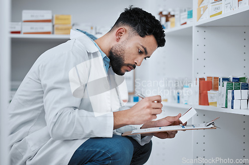 Image of Man, pharmacist and clipboard for inventory inspection on shelf in checking stock, medication or pills at pharmacy. Male person, medical or healthcare employee and checklist on pharmaceutical product