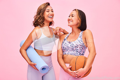 Image of Friends, fitness and women on pink background for yoga, training and exercise with ball and yogi mat. Sports, happy and people in studio with gym equipment for wellness, workout and healthy body