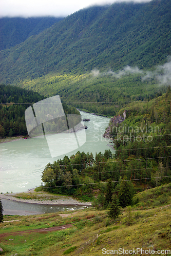 Image of Type with mountains on greater and tempestuous river