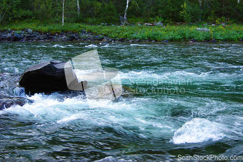 Image of Type on bugle river with transparent water