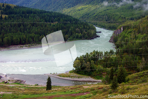 Image of Merging two rivers big and small landscape