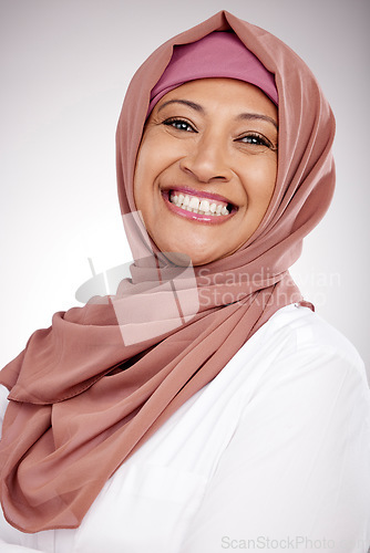 Image of Woman, muslim and face or happy portrait in hijab for fashion, culture and religion on a white background. Islamic or arabic person from Saudi Arabia and clothes, style or smile with faith in studio