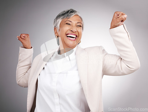 Image of Strong, laughing and portrait of a woman on a studio background for a professional career. Happy, funny and a mature manager or employee showing power, muscle or confidence isolated on a backdrop