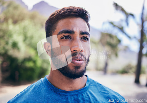 Image of Face, sweating and sports man at park for fitness, training fatigue and focus on exercise. Tired indian runner, serious athlete or thinking of workout, challenge or break from cardio marathon outdoor