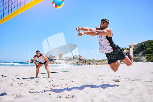 Image of Man, game and playing volleyball on beach in sports, match or score point in outdoor fitness or exercise. Active male person in teamwork, spike or ball over net in practice or training on ocean coast
