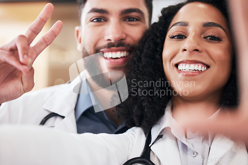 Image of Pharmacy, peace sign and selfie portrait of pharmacists for social media, profile picture and clinic website. Healthcare, emoji and man and woman take photo for wellness, medicine and medical service