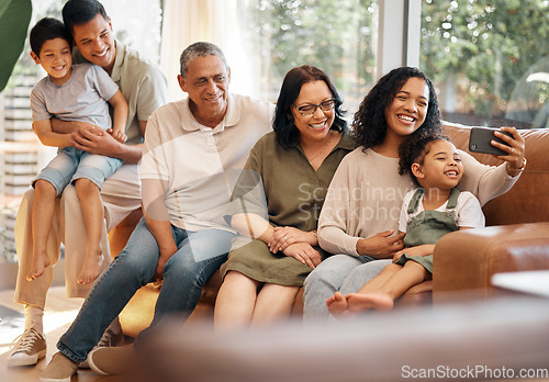 Image of Happy family, selfie and grandparents and kids on sofa for holiday, love and relax together at home. Interracial people, mother and father with children in living room, profile picture or photography