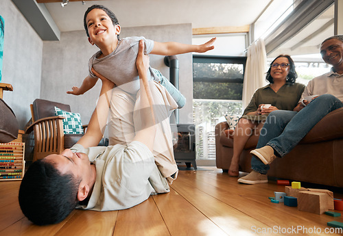 Image of Airplane, love and boy child with father on a floor for playing, games and bond at home with grandparents. Flying, fantasy and excited kid with parent in living room for fun family time in a house
