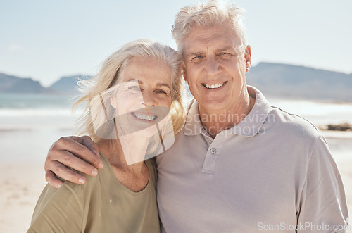 Image of Beach, happy and portrait of senior couple on a romantic vacation, holiday or weekend trip. Smile, travel and elderly man and woman in retirement bonding by the ocean on an outdoor adventure together