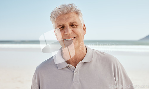 Image of Portrait, beach and old man with retirement, happy and travel with summer vacation, Canada and wellness. Face, senior person or traveler on seaside holiday, weekend break or relax with peace or smile