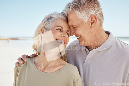 Image of Senior couple, love and outdoor at the beach with happiness, freedom and care on vacation. Face of a man and woman on retirement holiday, adventure and romantic trip in nature to relax and travel