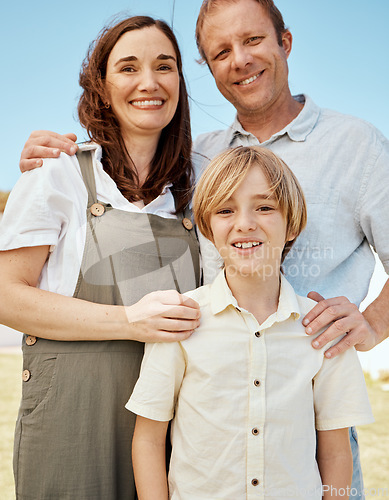 Image of Family, portrait and parents with child outdoor, happy together with summer, support and trust. Love, care and people in nature, bonding on the weekend with mother, father and boy kid outside