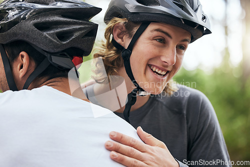 Image of Hug, happy and cycling with friends in nature for fitness, health and partnership. Teamwork, motivation and sports adventure with men training in forest for wellness, workout and freedom together