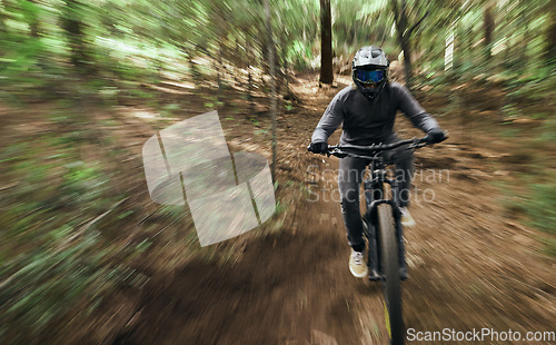 Image of Bike, man in forest and speed blur in workout outdoor in woods for healthy body. Mountain bicycle, nature and fast athlete training, cycling or off road adventure on journey, exercise or sport travel