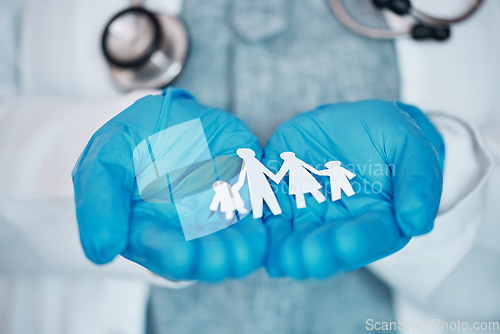 Image of Medical, paper and family with hands of doctor in clinic for life insurance, support and surgery. Healthcare, medicine and hope with closeup of person in hospital for consulting, community and trust