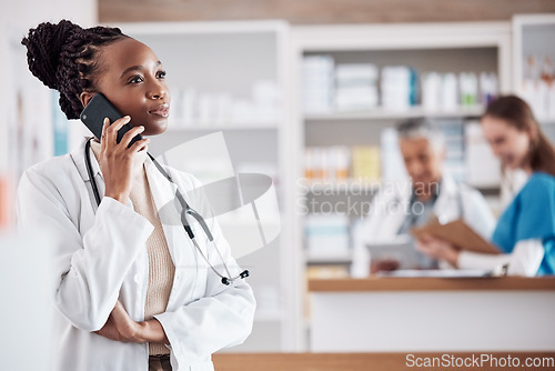 Image of Pharmacist, medical or black woman on a phone call for medicine, customer service or healthcare support. Listening, doctor or African consultant talking or speaking of prescription or advice to help