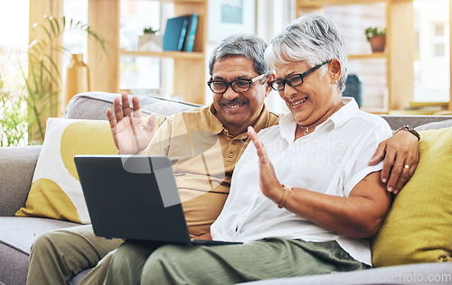 Image of Senior couple, video call and laptop in home with voip communication, digital chat and talk. Happy man, woman and wave hello on computer in virtual conversation, online contact and retirement on sofa