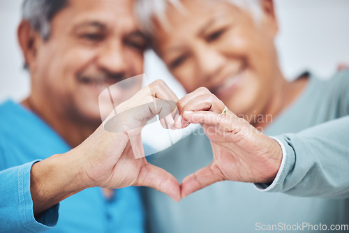 Image of Heart, mature couple and hands for care in healthy relationship, connection or commitment to marriage. Love sign, romance of man and woman in loyalty, kindness or emoji to support in trust together