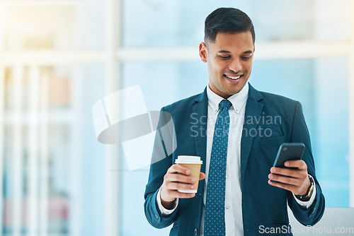 Image of Cellphone, coffee and business man in office online for social media, networking and typing emails. Corporate worker, professional and person with tea on phone for internet, website and mobile app