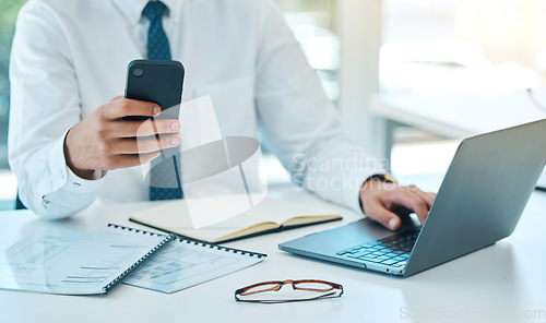 Image of Laptop, phone and hands typing in office, multitask and working on project. Computer, smartphone and business consultant at desk on internet, man networking on email app and research info on website