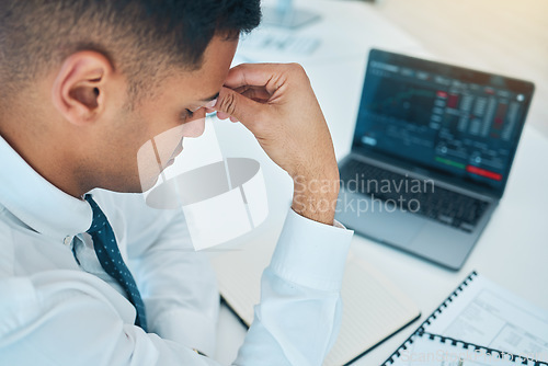 Image of Business man, headache and laptop of stock market crash, bankruptcy and financial mistake, error or wrong statistics. Sad, stress or fatigue trader on computer screen, data or trading with depression