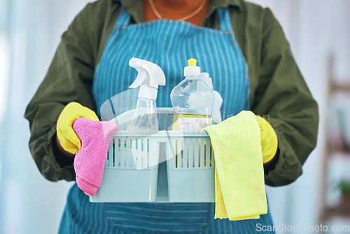 Image of Cleaning, basket with chemical detergent and cloth, cleaner person with housekeeping or hospitality. Janitor, maintenance and labor, supplies and fabric with service, disinfectant and hygiene