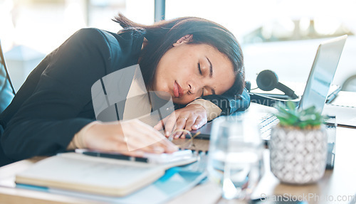 Image of Tired, work and a woman at a desk for sleeping, corporate or working burnout in an office. Narcolepsy, table and a female business employee with a nap, rest or fatigue from company stress or job