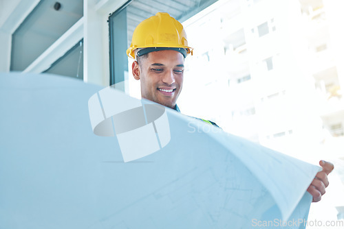 Image of Blueprint, project and happy architect, man or engineer reading floor plan, design or real estate sketch. Happiness, renovation contractor and construction worker working on architecture development