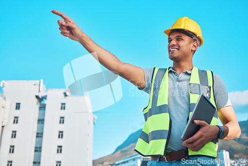 Image of City, tablet and happy man, architect and pointing at construction site, real estate development or property buildings. Civil engineering, project and engineer gesture at Los Angeles, California view