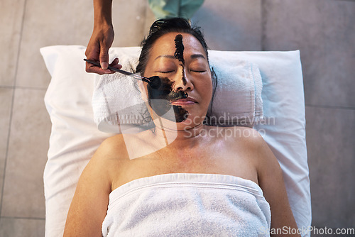 Image of Relax, facial and senior woman in spa for wellness, beauty treatment and hospitality. Peace, cosmetics and salon with customer and face mask in hotel for health, vacation and skincare from above