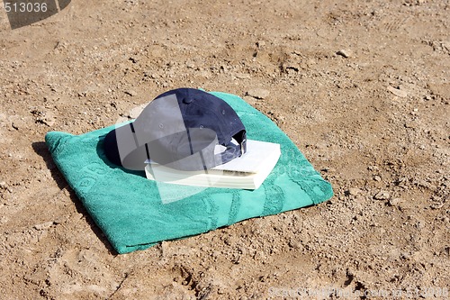 Image of book and beach