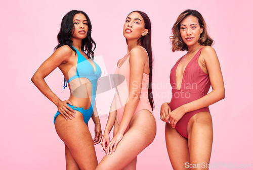 Image of Swimwear, bikini and portrait of women on pink background for summer fashion, style and self love. Beauty, friends and group of people in bathing suit for body positivity and diversity in studio