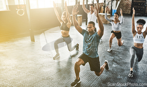 Image of Lunge, group or people in gym with personal trainer for balance, fitness training or a healthy body. Women, men or coach instructor in exercise or workout for strong legs in wellness studio class