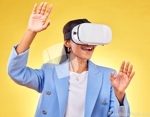 Image of Business woman, virtual reality glasses and studio with hands, smile and 3d user experience by yellow background. Futuristic tech entrepreneur, ar vision and happy for metaverse, cyber ux or system