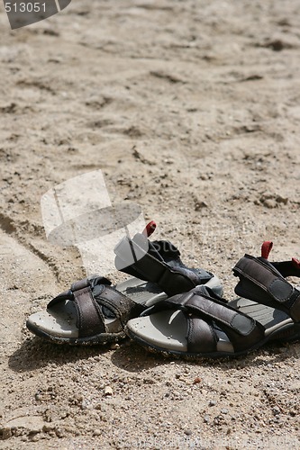 Image of sandals on the beach