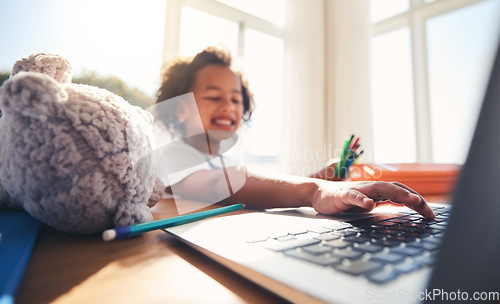 Image of Hand, laptop and education with a girl in her bedroom for remote learning or private home school. Computer, children and homework with a young female kid at a desk for growth or child development