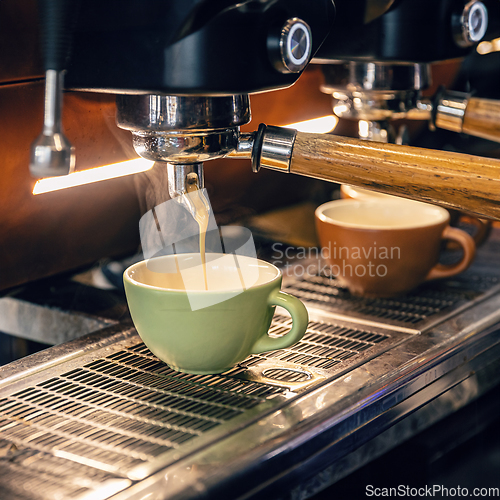 Image of Espresso machine making fresh coffee